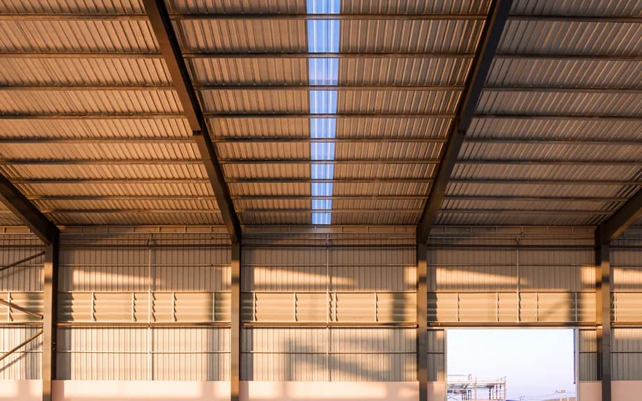 Steel frame carrying profiled metal decking
