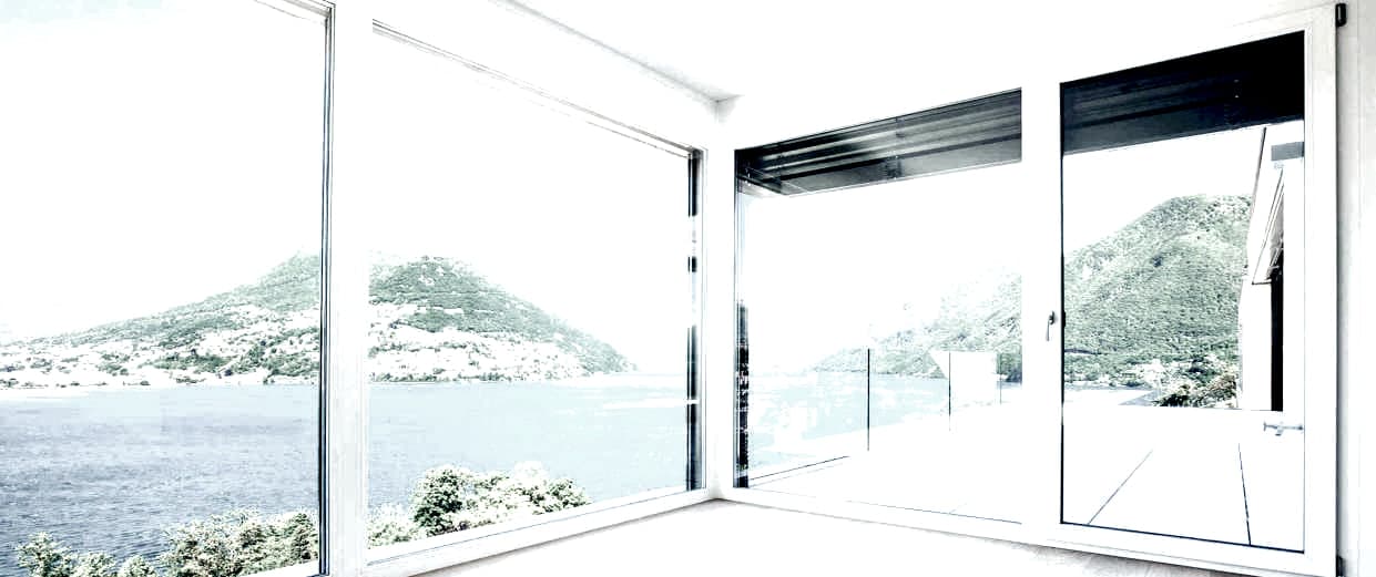 Aluminium sliding doors framing a sea view