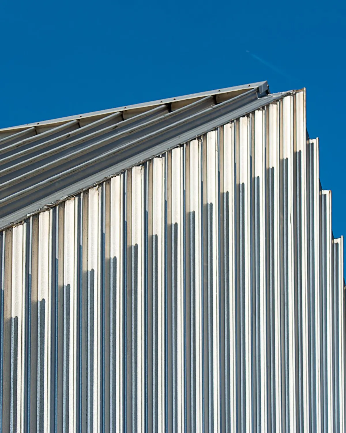 Profiled steel cladding running the length of an industrial facade