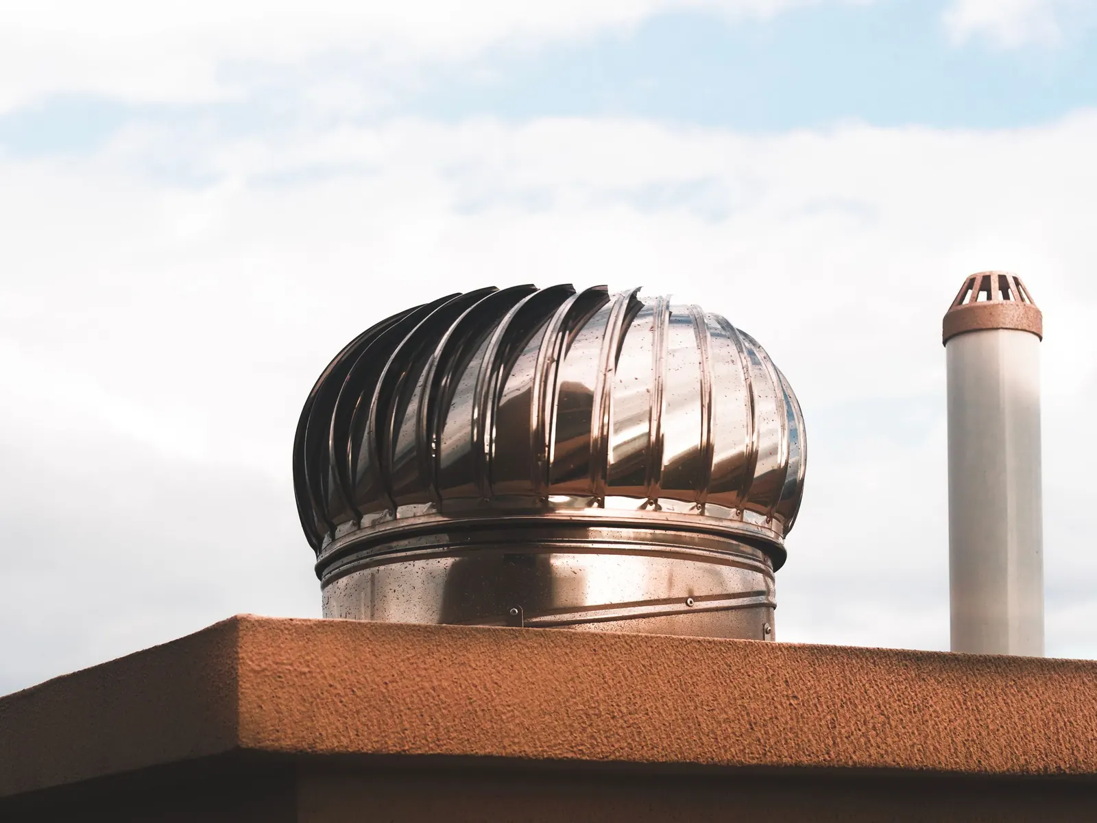Turbine roof ventilator on an industrial roof